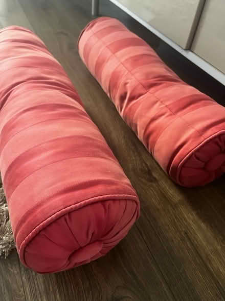 Photo of free Cushions x 2, light red, cylinder (HA8 / Edgware) #4