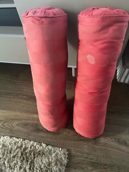Photo of free Cushions x 2, light red, cylinder (HA8 / Edgware) #1