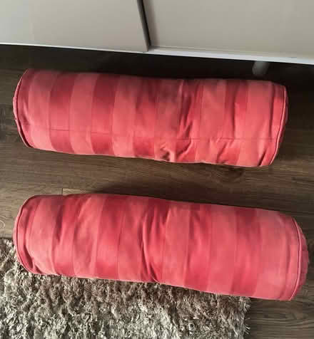 Photo of free Cushions x 2, light red, cylinder (HA8 / Edgware) #3