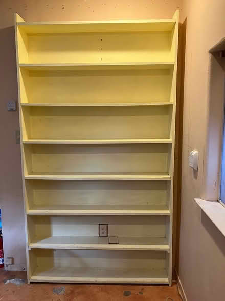 Photo of free Tall wooden bookcase (109 Echo Ave, Oakland 94611) #1
