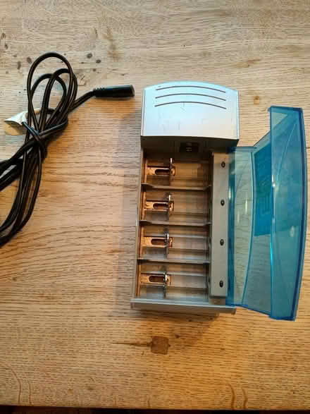 Photo of free Household battery charger (Hunter Ln & Spring Valley Rd) #2