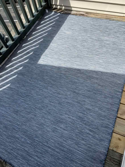 Photo of free Outdoor rug (Near baseball stadium) #1