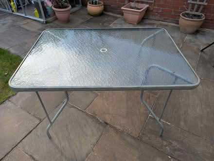 Photo of free Patio table. Metal and glass. Fair condition. (Gateacre L25) #1