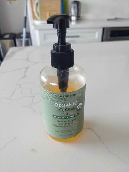 Photo of free Bottle of jojoba oil, half full (San Mateo Knolls) #1