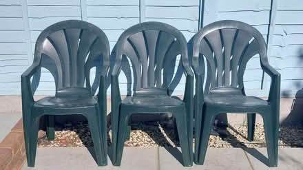 Photo of free Three green plastic garden chairs (Ealing Pitshanger W5) #1