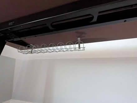 Photo of free 63"W x 26"D desk w/ cable mgmt tool (1533 Templeton Pl) #4