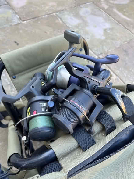 Photo of free Fishing rucksack/chair and three reels (Pokesdown BH6) #1