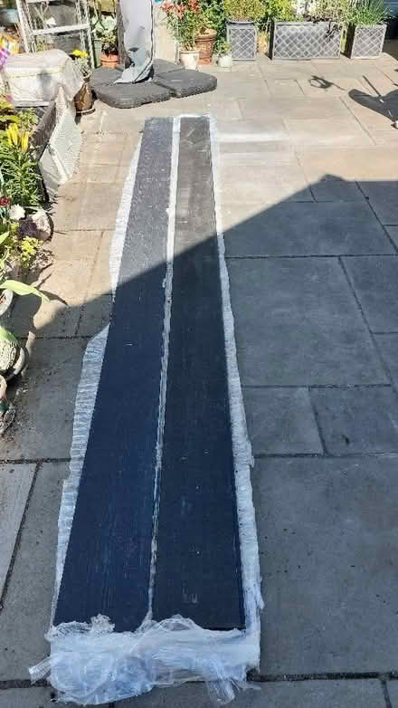 Photo of free 2 lengths of fibre cement exterior cladding 3.6 metres black (Swaythling SO16) #1