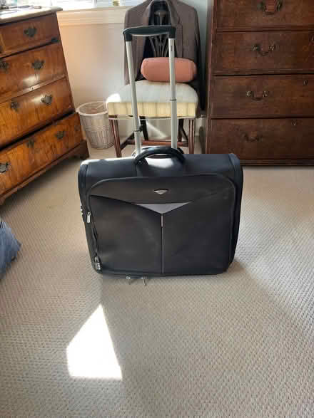 Photo of free Antler wheeled suitcase/suit carrier (Smallcombe Woods) #1