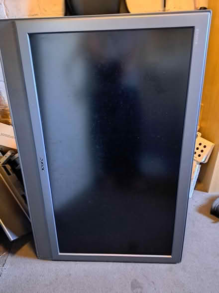 Photo of free Tv and tall fan (Rotherham S65) #1