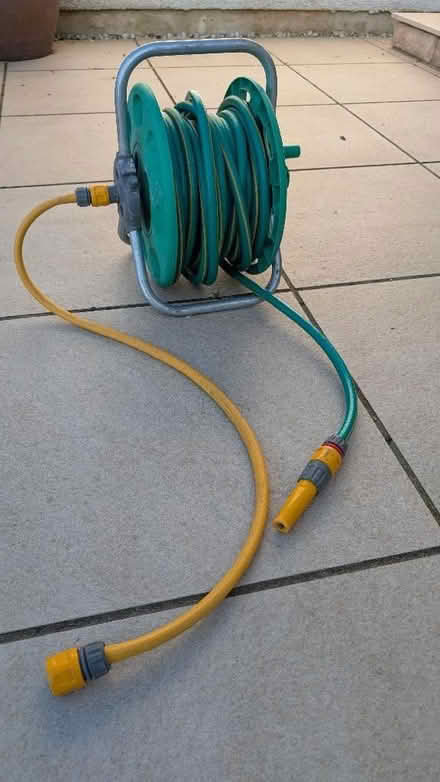 Photo of free Hozelock hose and reel (Currie EH14) #1