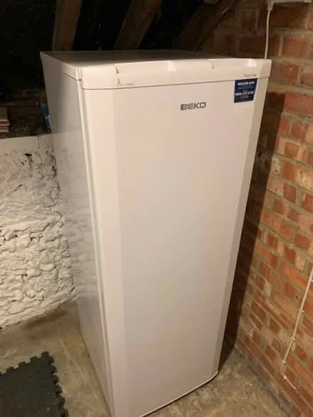 Photo of free Beko tall freezer full of food (OX10 6hq) #1