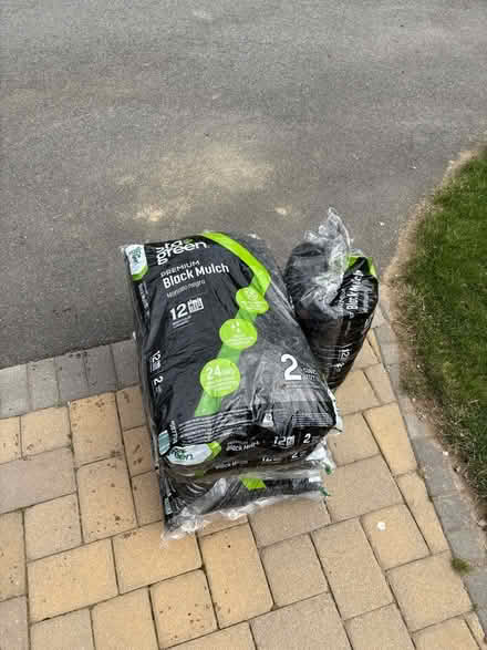 Photo of free 5 bags of black mulch (Lexington) #1