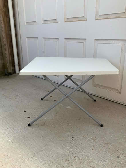 Photo of free Small Plastic foldaway table (West Wittering) #1