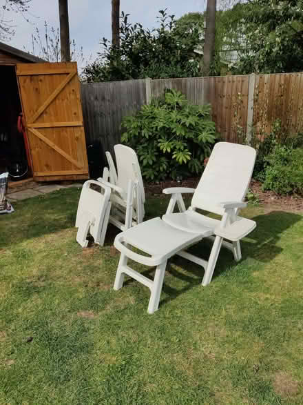Photo of free 2 white plastic sun loungers with footrest and drinks tray (Hanworth RG12) #2