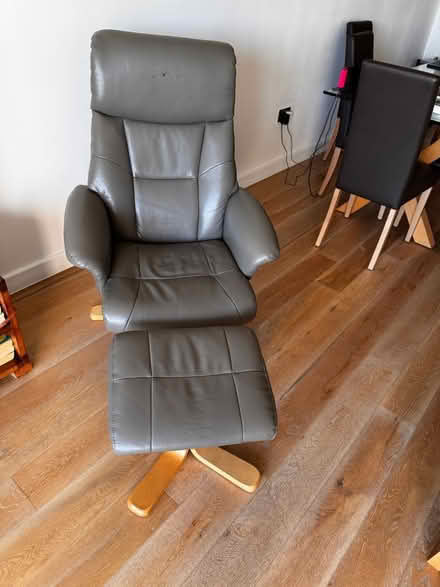 Photo of free Grey leather armchair and footstool (Headland Rd, Newquay) #1