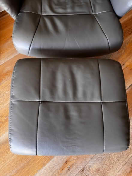 Photo of free Grey leather armchair and footstool (Headland Rd, Newquay) #2