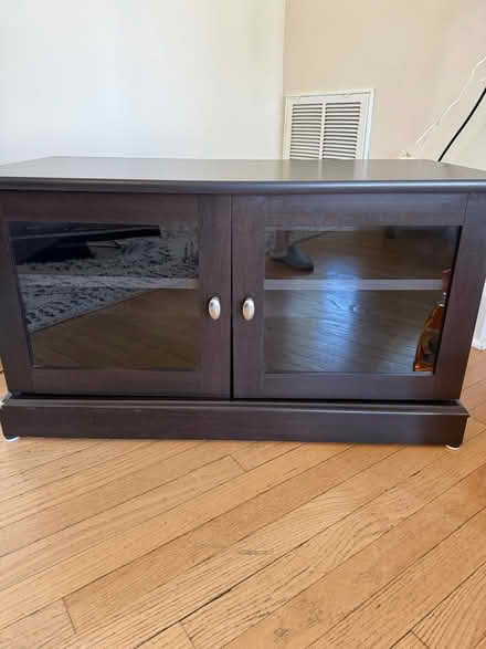 Photo of free Dark Brown Wood TV stand/Storage (Parkville) #1