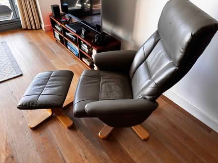 Photo of free Grey leather armchair and footstool (Headland Rd, Newquay) #3