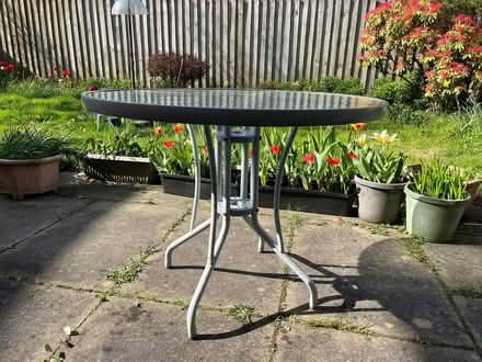Photo of free Metal glass-topped garden table 92 dia x 71 height (Barleybank G66) #2