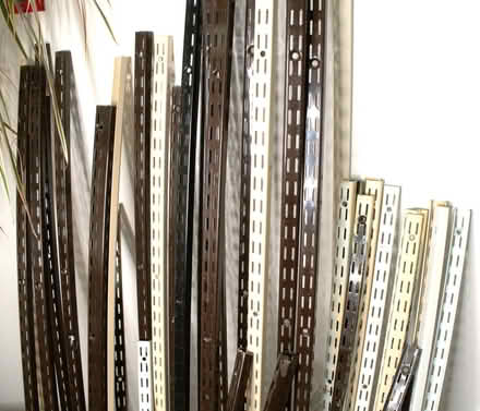 Photo of free Twin slot shelving uprights and brackets, good condition (Burgess Hill RH15) #1