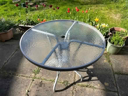 Photo of free Metal glass-topped garden table 92 dia x 71 height (Barleybank G66) #1