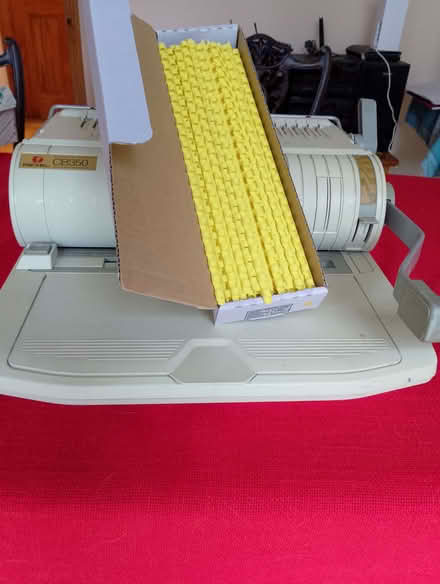 Photo of free Binding machine and plastic binding rings (CO11) #1