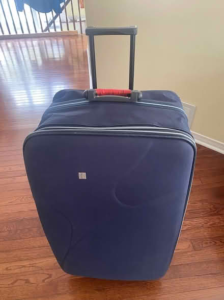 Photo of free Large suitcase (Orleans) #1