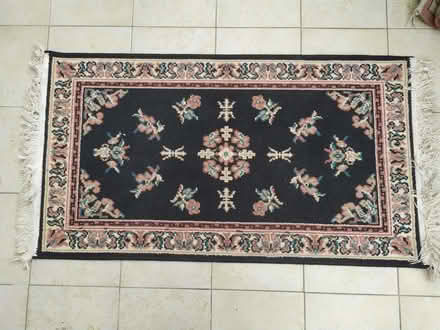 Photo of free Small black and pink rug (Stanford in the Vale SN7) #1