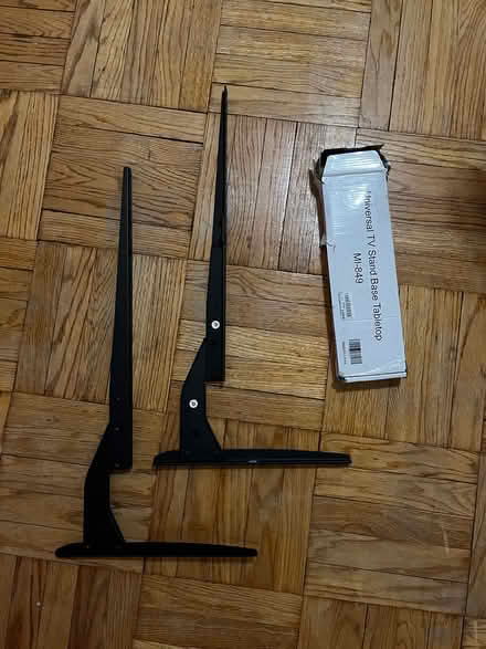Photo of free Universal TV stand (Inwood) #2