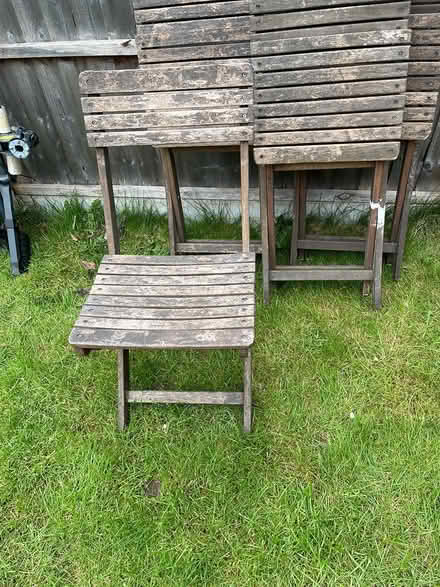 Photo of free 4 wooden garden chairs (LS7) #2