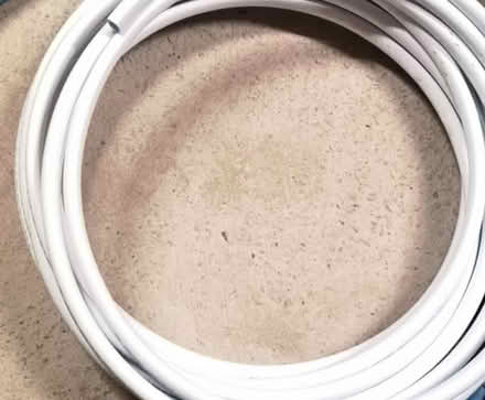 Photo of coiled white water pipe. (Queenstown FY3) #1