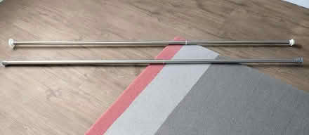 Photo of free 2 extending curtain poles (Handside, WGC, AL8) #1