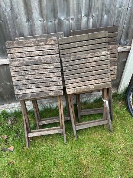 Photo of free 4 wooden garden chairs (LS7) #1