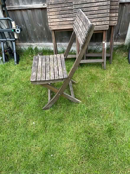 Photo of free 4 wooden garden chairs (LS7) #3