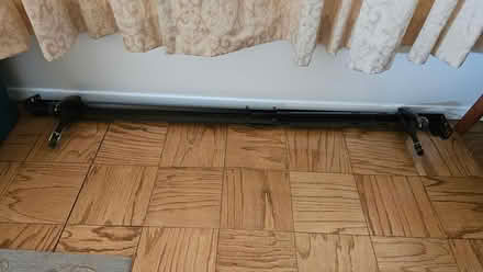 Photo of free Full size bed frame w/ wheels (North Bethesda MD) #1