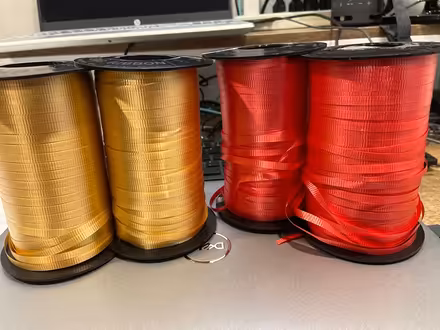 Photo of free Gold and red curling ribbon (Streetsville) #1