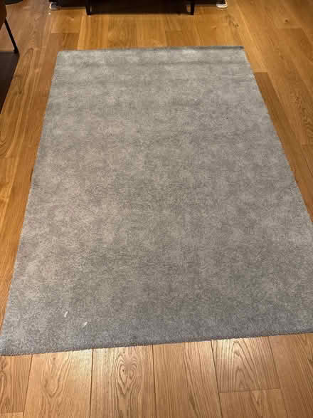 Photo of free Grey rug 4.4’ by 6.5’ (London SW19) #1