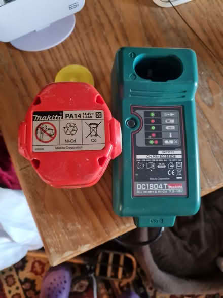 Photo of free Old type Makita charger + 2 batteries (St Bees CA28) #1