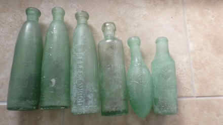 Photo of OLD BOTTLES with Writing on - Glass or Stone / Pottery (Blackpool FY1) #1