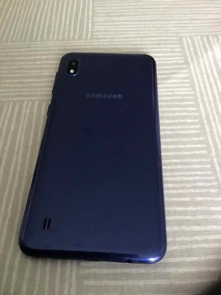 Photo of free Samsung A10 mobile phone with charger (Alderley Edge SK9) #2