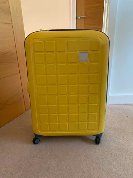 Photo of free Large Tripp suitcase (Yately) #1