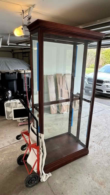 Photo of free Howard Miller glass curio cabinet (Bham/Bloomfield/Troy) #1