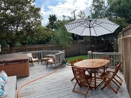 Photo of free Gray/white stripe outdoor umbrella (16th St Heights/Petworth) #2