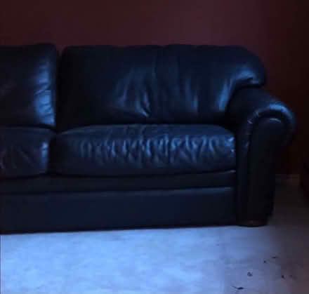 Photo of free Black leather couch (New Hyde Park, Long Island) #1