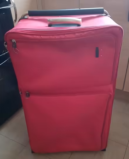 Photo of free Lightweight Suitcase - red (toxteth L8) #1