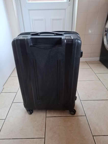 Photo of free Black medium tripp suitcase (CH49) #2