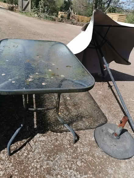 Photo of free Table, parasol and base (Penzance - Tremithick Cross) #1
