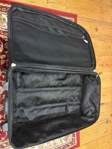 Photo of free Large two wheeled suitcase (Central Reading RG1) #2