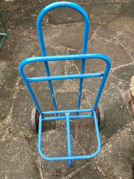 Photo of free Ex newspaper trolley (Banstead) #1